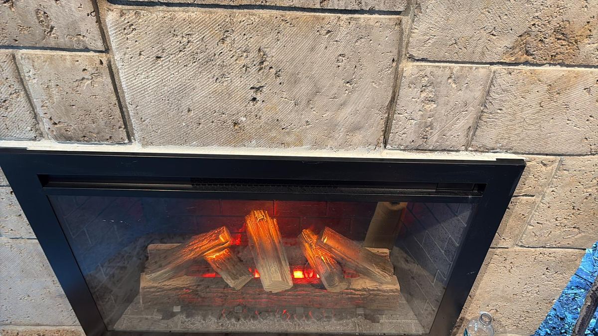 Newly installed electric fireplace insert