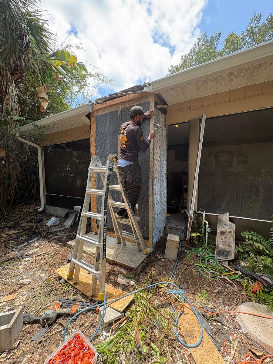 Technician rebuilding a chimney